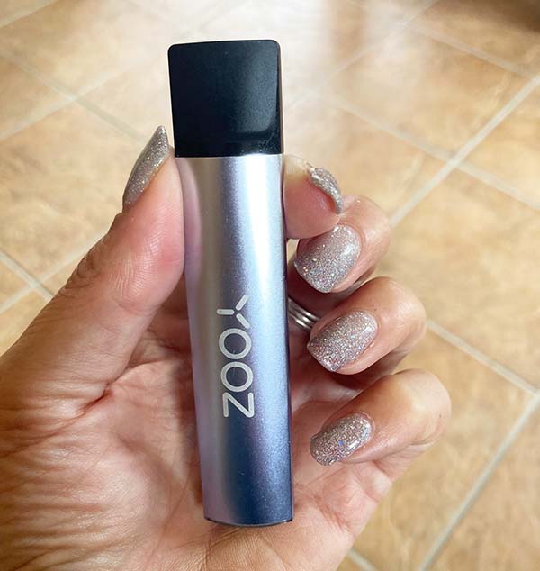 yooz-device-in-hand yooz-device-in-hand
